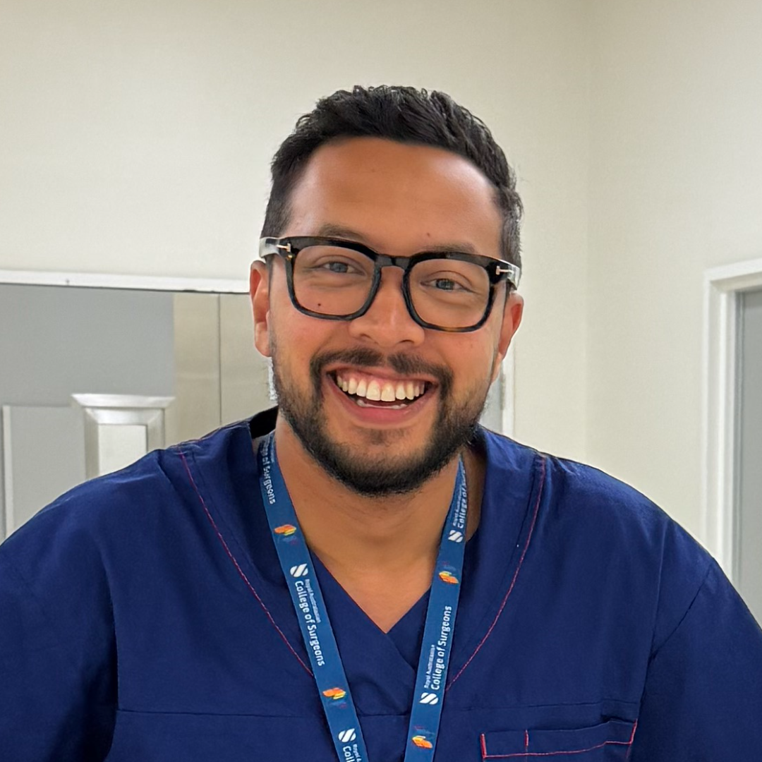 Dr Joel Rabindran in theatre scrubs