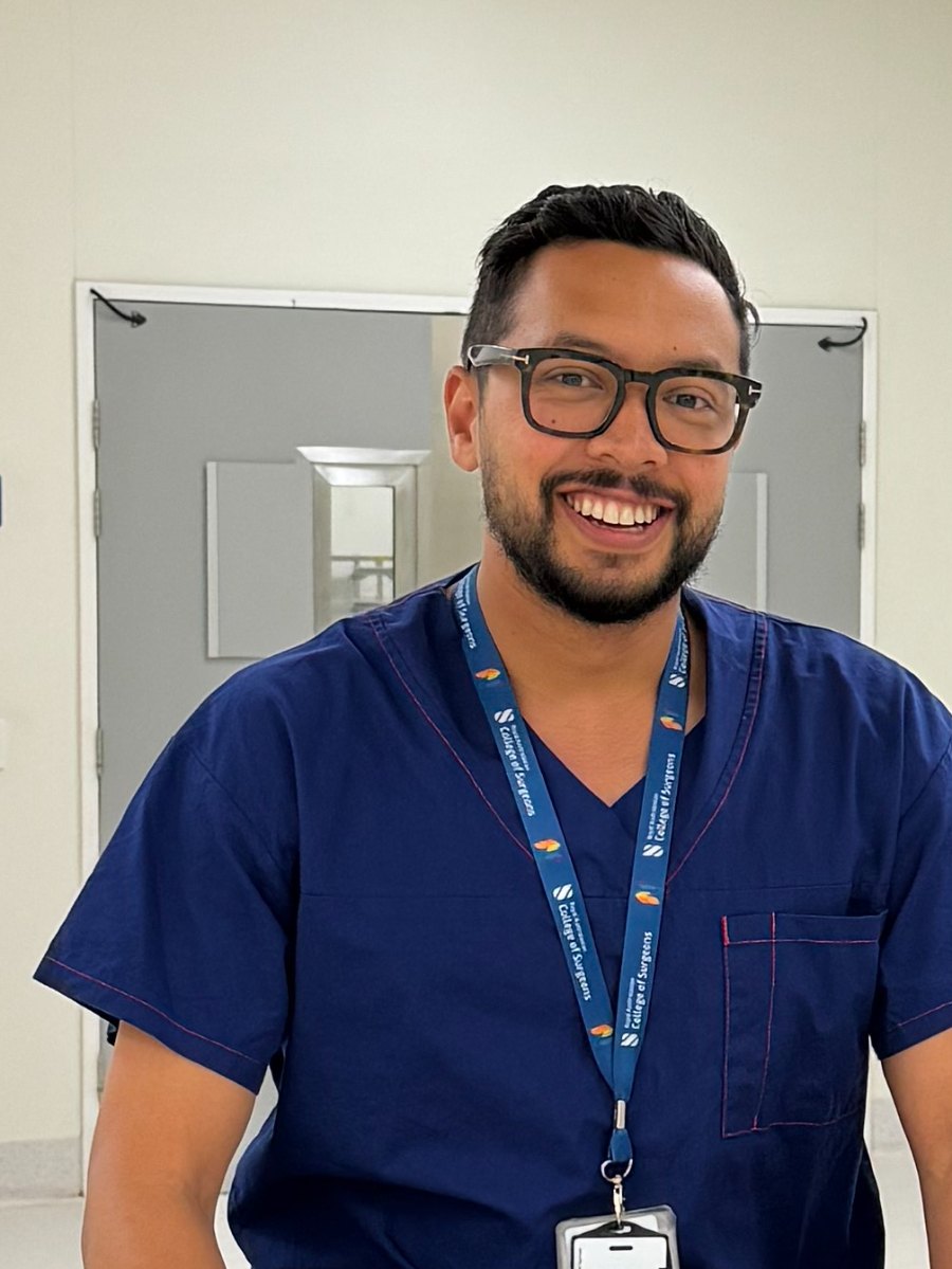 Dr Joel Rabindran, specialist general, bariatric and upper GI surgeon, in theatre